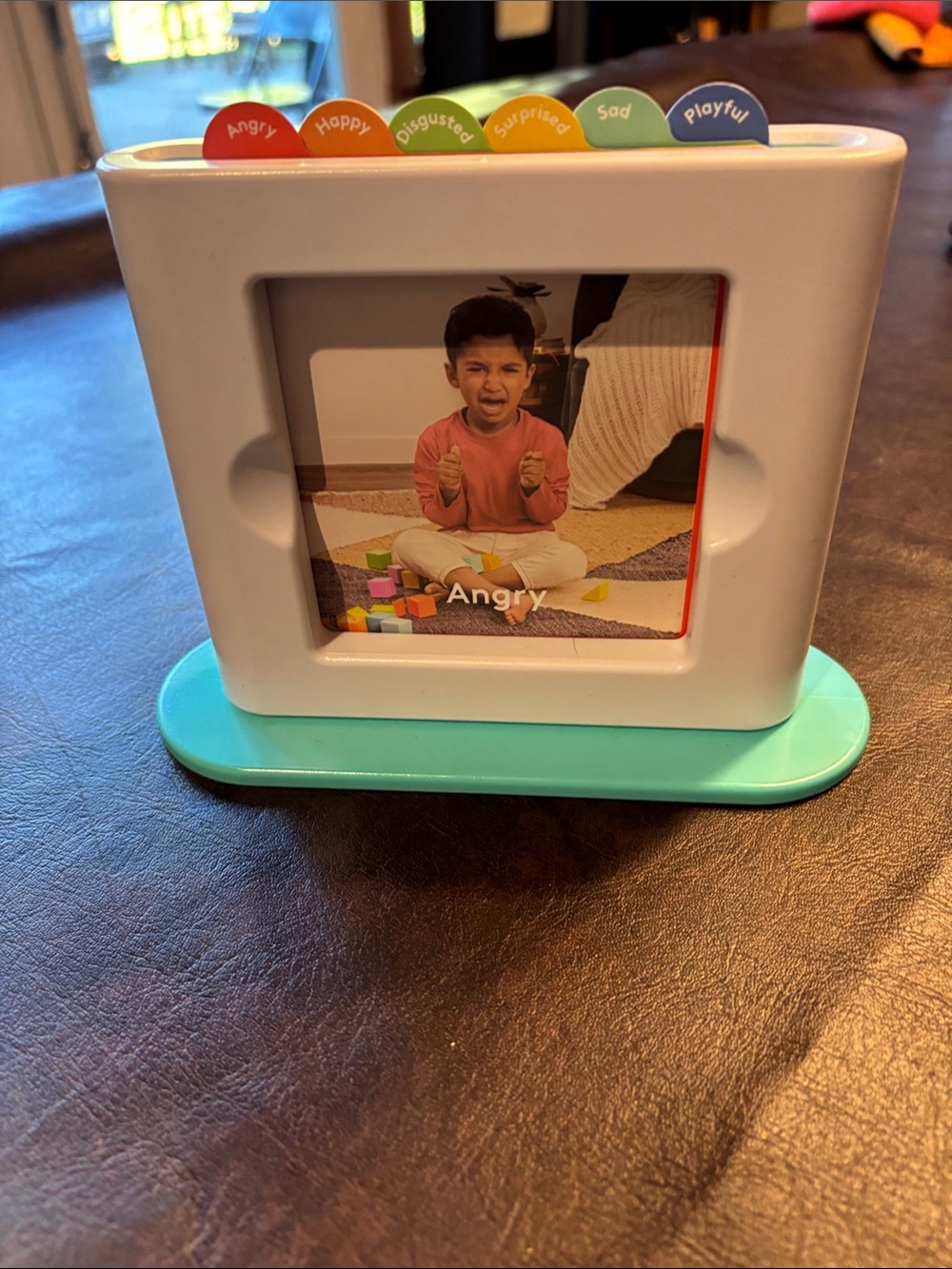 Lovevery Emotions Photo Frame & Learning Tabs - White with Teal Base